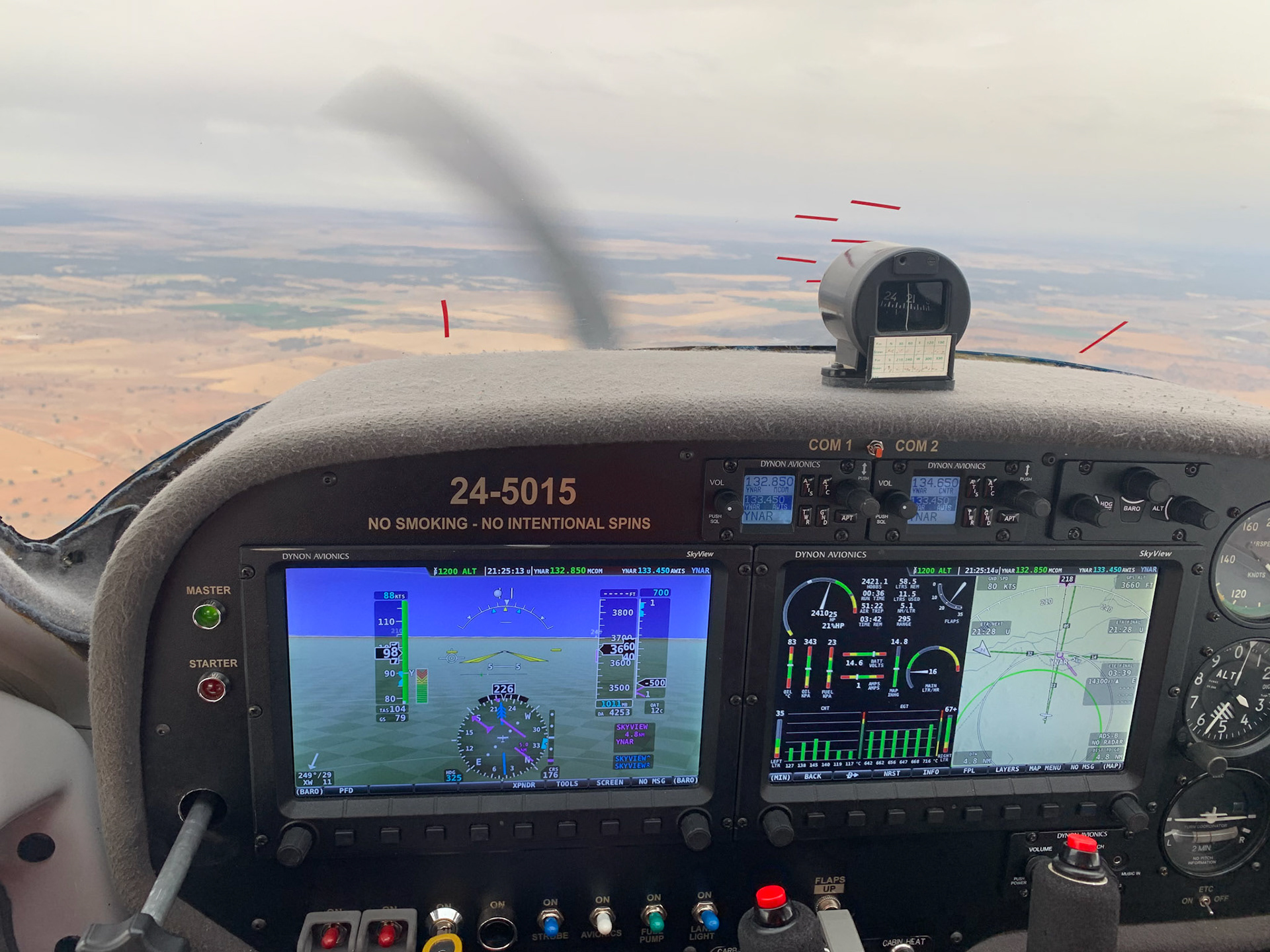 Student at the controls over the Riverina